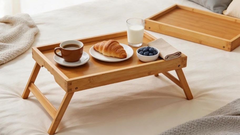 Bamboo Bed Tray Tables with Folding Legs 2-Pack on top of the bed