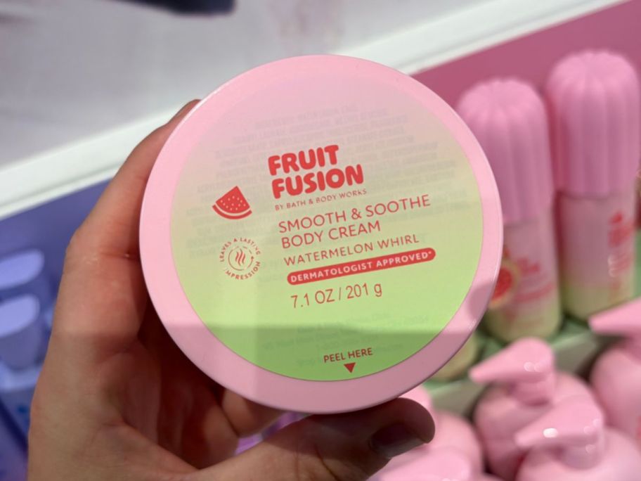 Bath & Body Works Fruit Fusion Body Cream in hand in store