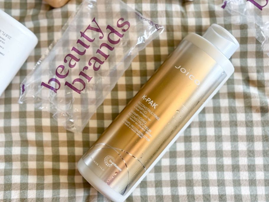 A one liter bottle of Joico Shampoo