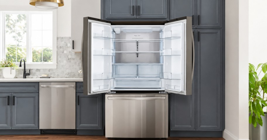 Open LG French-door refrigerator in a bright modern kitchen