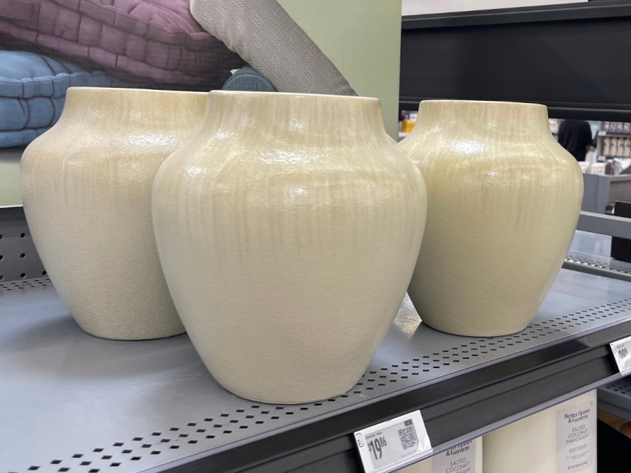 off white ceramic vases on a store shelf