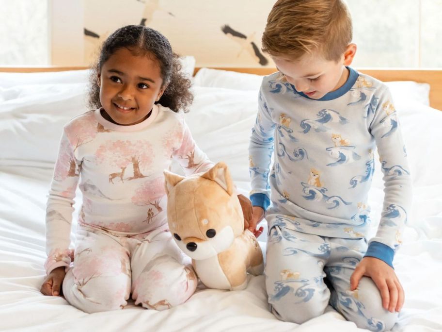Two kids wearing Burt's Bees Baby Pajamas