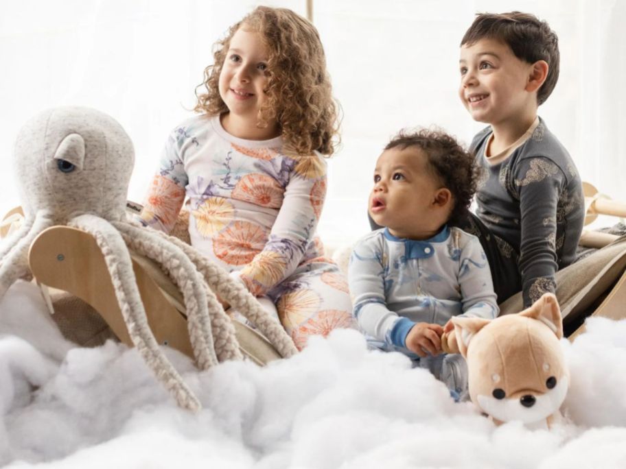 3 kids wearing Burt's Bees Baby Pajamas