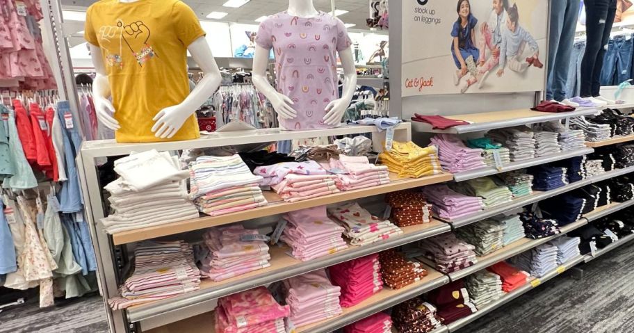 A display with shelves of Cat & Jack Girls Clothing at Target