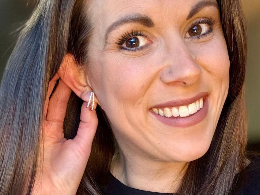 woman wearing Cate & Chloe Corina 18k Gold Plated 20mm Hoop Earrings w/ Swarovski Crystals