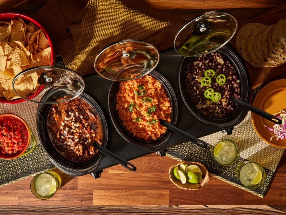 Chefman Stainless Steel Triple Slow Cooker & Buffet Server on table with rice and beans in it