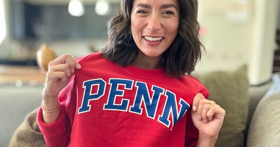 Women wearing a Fanatics PENN Sweatshirt