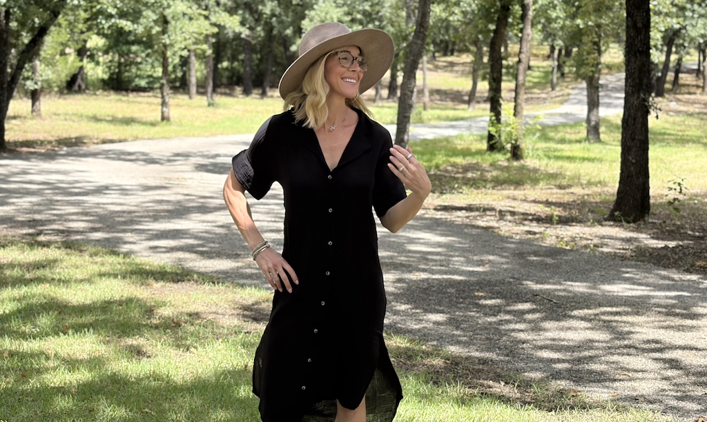 Collin wearing Anthropologie black button up dress