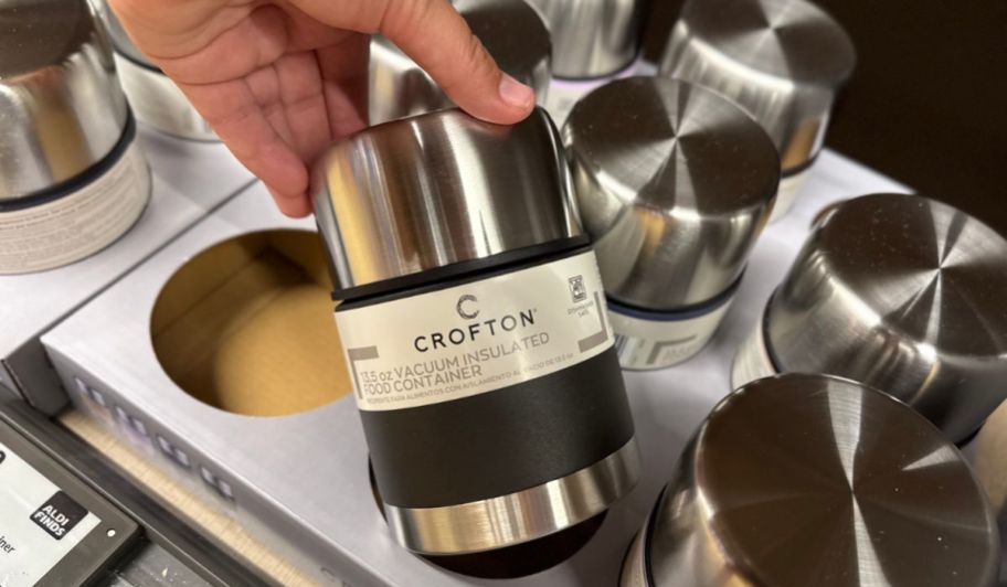 hand holdingCrofton Vacuum Insulated Food Container at a store display
