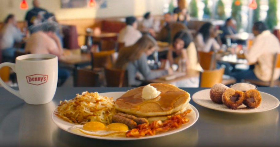 Denny's coffee and breakfast on restaurant tabletop