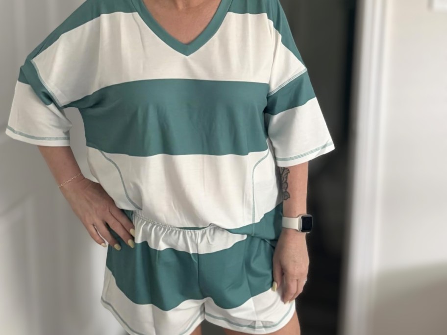 woman wearing green and white striped t-shirt and shorts lounge set