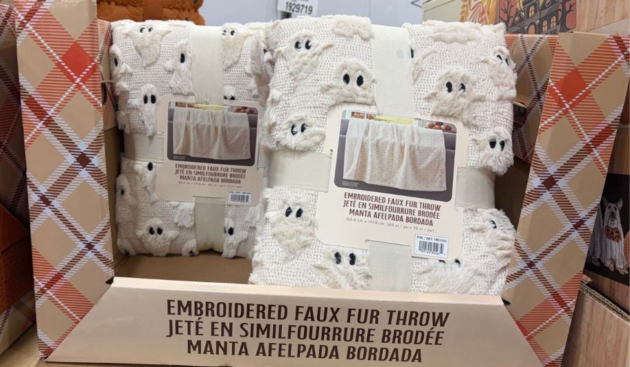 white Ghost halloween throw inside of its display box