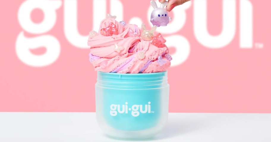 pink whipped slime in a blue container