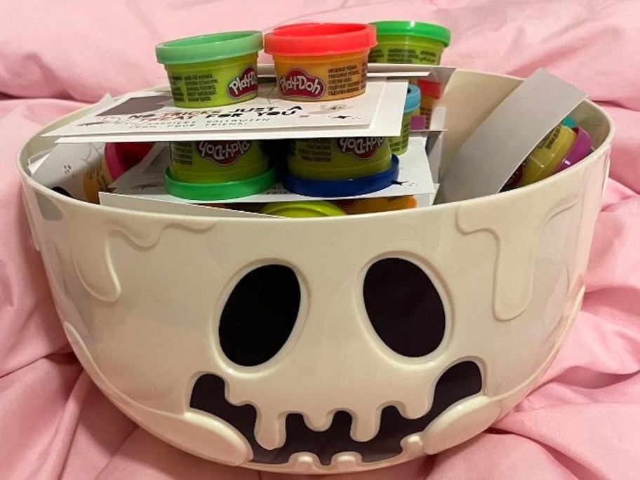 ghost candy bowl on pink sheet