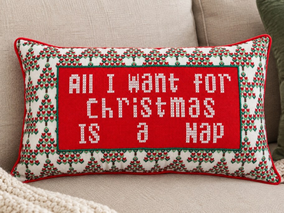 christmas pillow with fun saying on couch