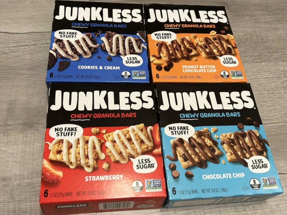 4 boxes of Junkless Chewy Granola Bars on a floor