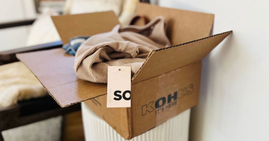 A kohl's box with women's clothing inside