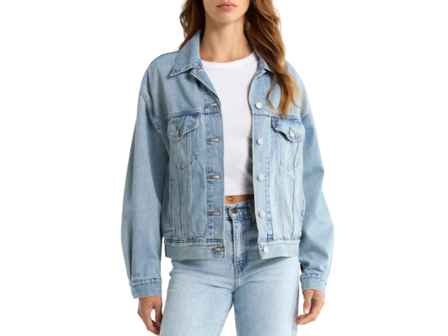 a woman in a denim jacket