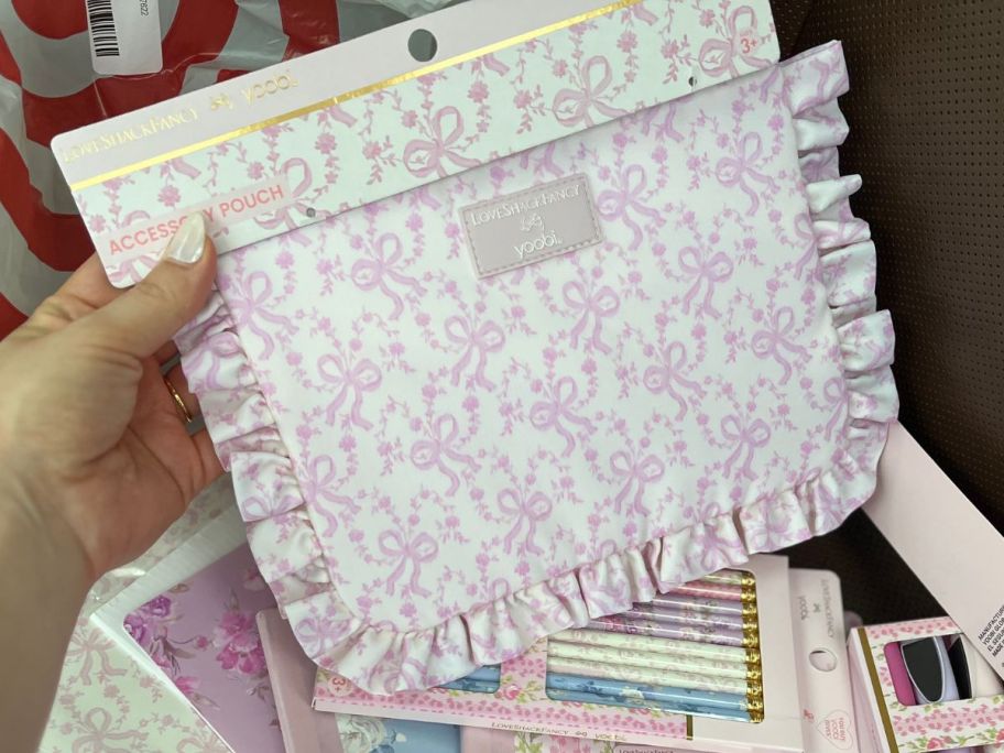 hand holding LoveShackFancy x Target Yoobi Pencil Case