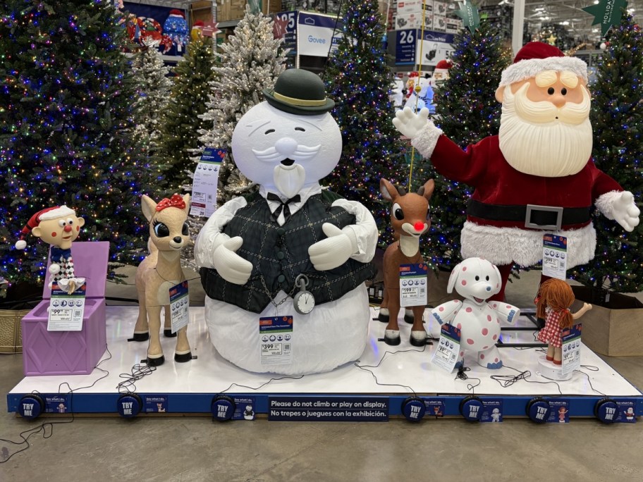 rudolph the red-nosed reindeer characters in animatronic form displayed at lowe's store