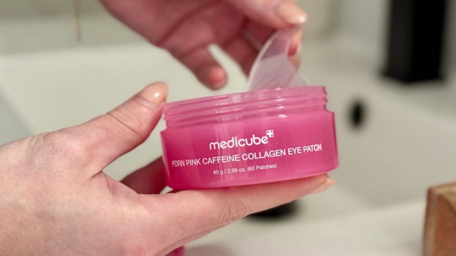 hand holding Medicube caffeine patches