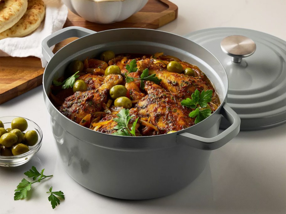 stew inside of a grey dutch oven on a table