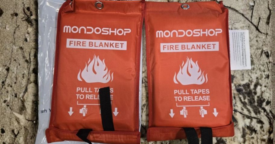 two red MondoShop Emergency Fire Blankets on kitchen counter