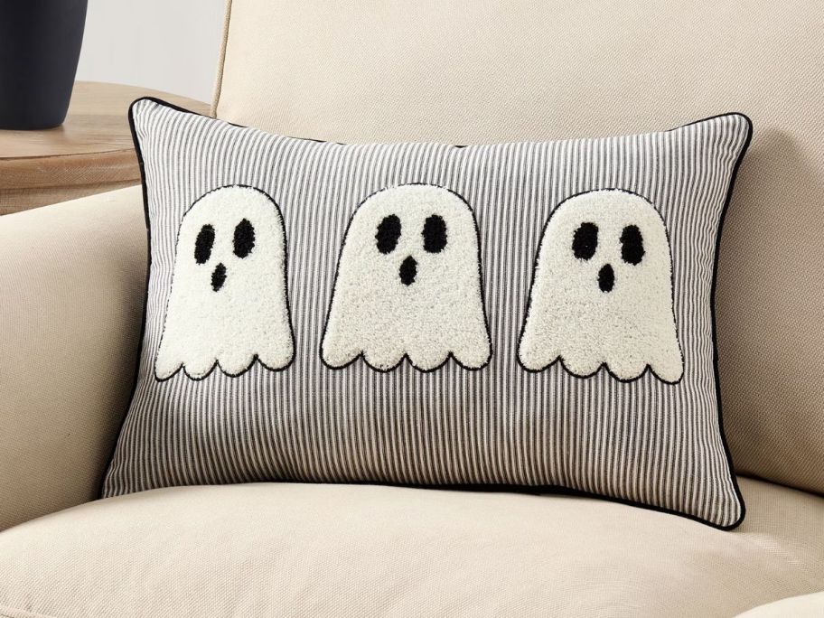 My Texas House 14" x 20" Ivory/Black Tufted Ghosts Decorative Pillow on couch