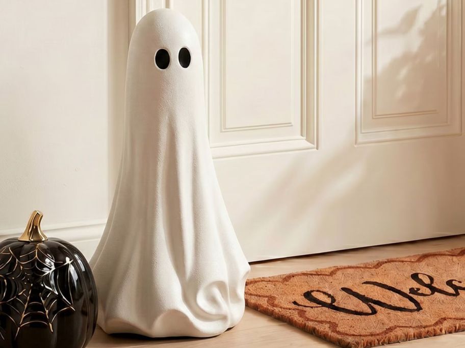 My Texas House Large Ghost Tabletop Decoration next to door
