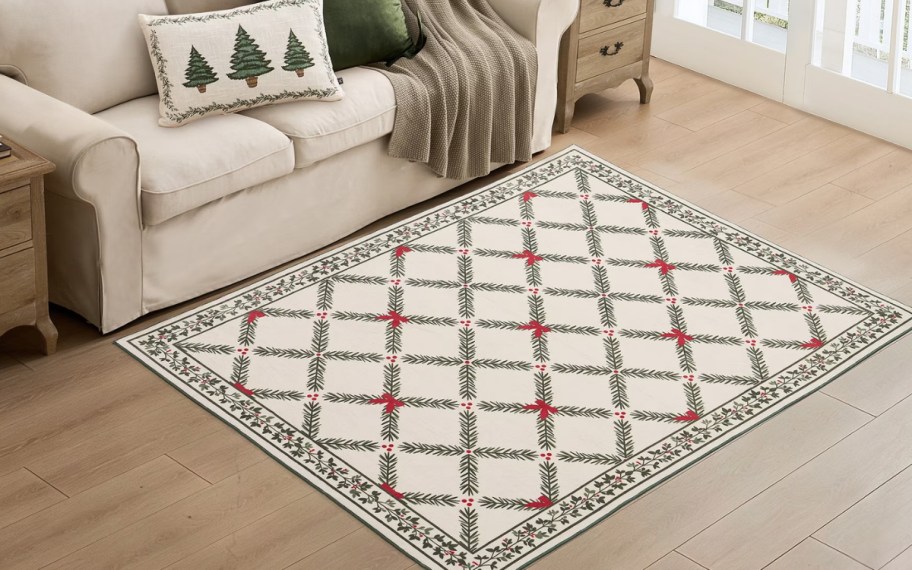 red white and green bow and floral print rug in front of a sofa