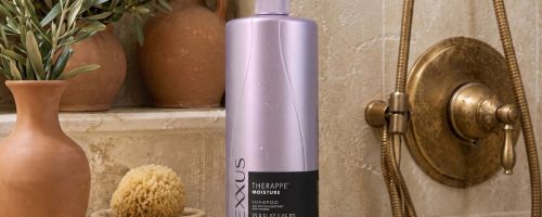 Nexxus shampoo on top of a bathroom counter
