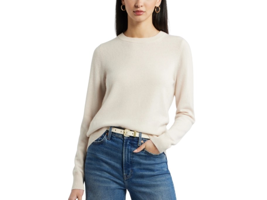 a woman in a crew neck cashmere sweater