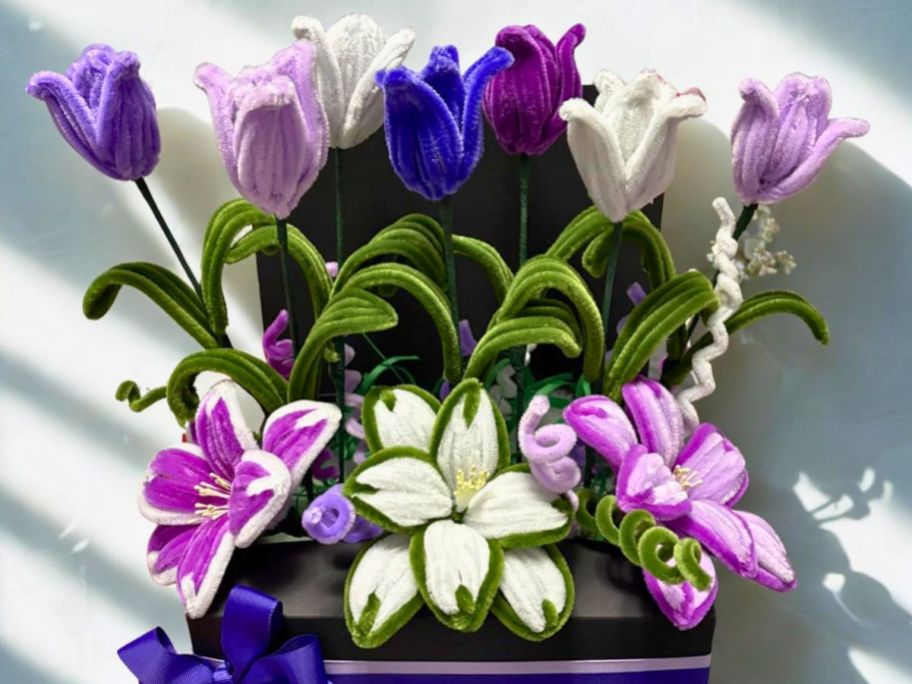 large arrangement of pipe cleaner flowers in different colors