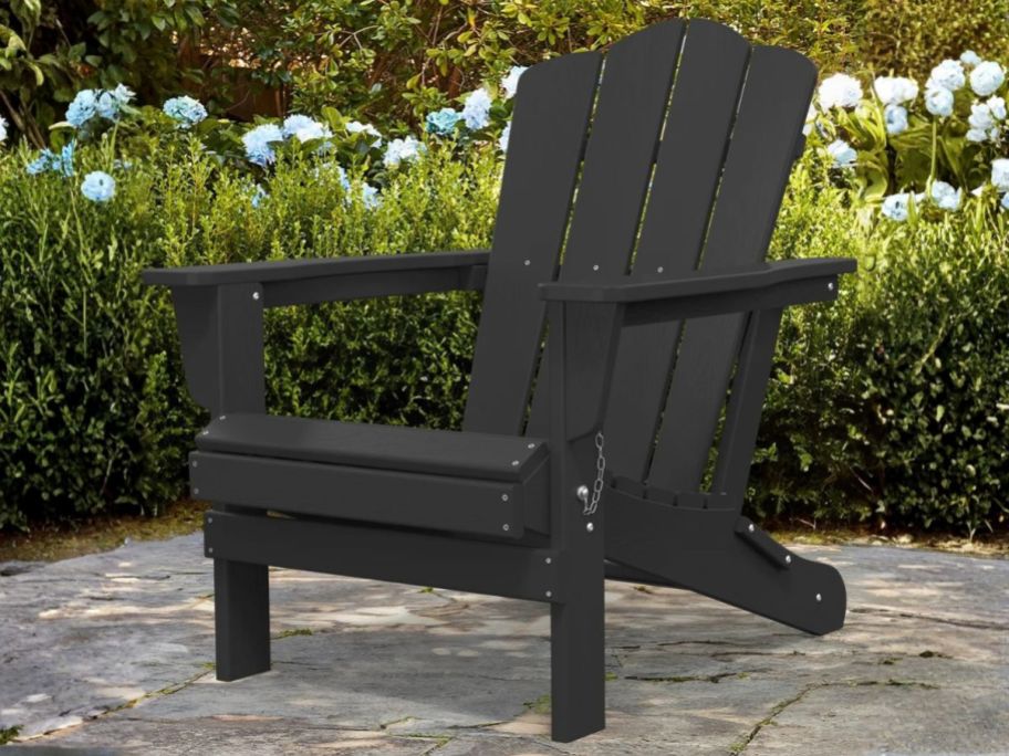 Rosecliff Heights Wolak Foldable Outdoor Adirondack Chair on patio