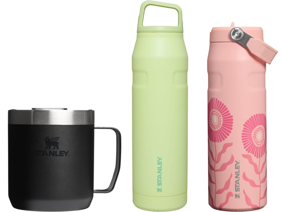 black mug and green and pink water bottles