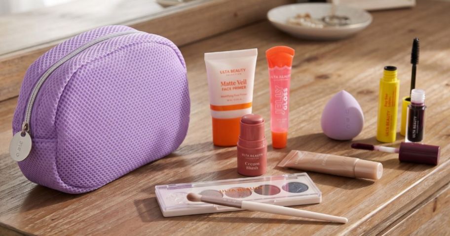 Ulta Beauty Collection Cosmetics Gift Set with purple bag on a dresser