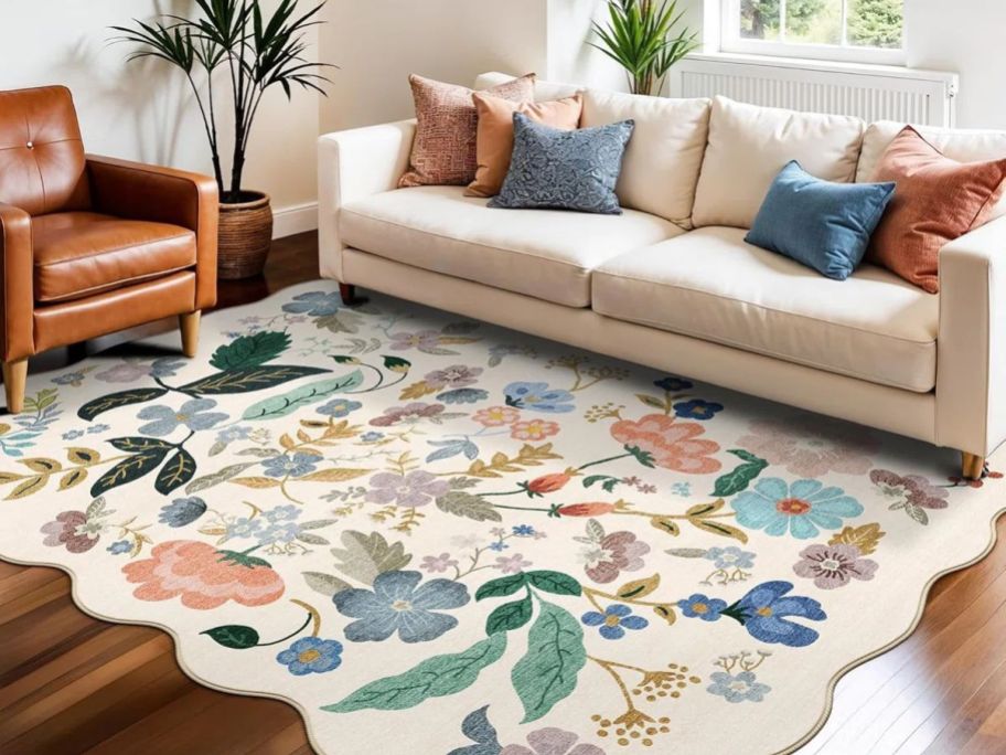 Winston Porter Washable Floral Non-Slip Rug in living room