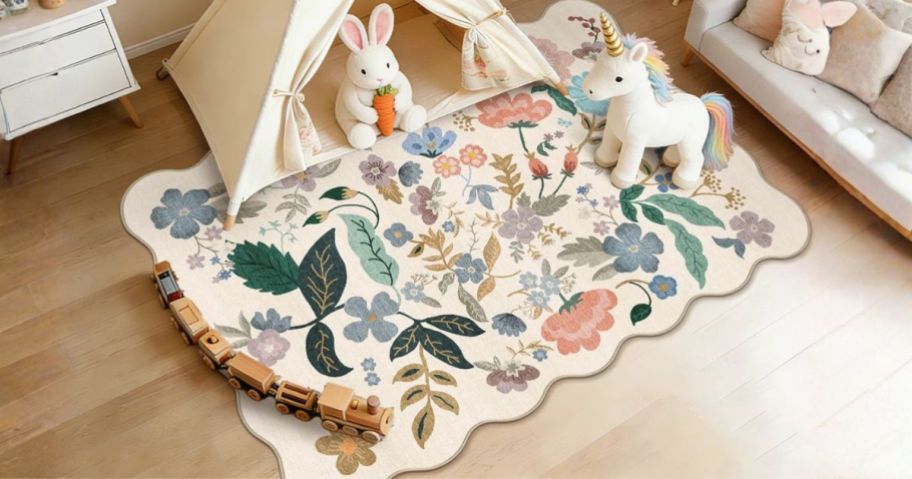 Winston Porter Washable Floral Non-Slip Rug in playroom