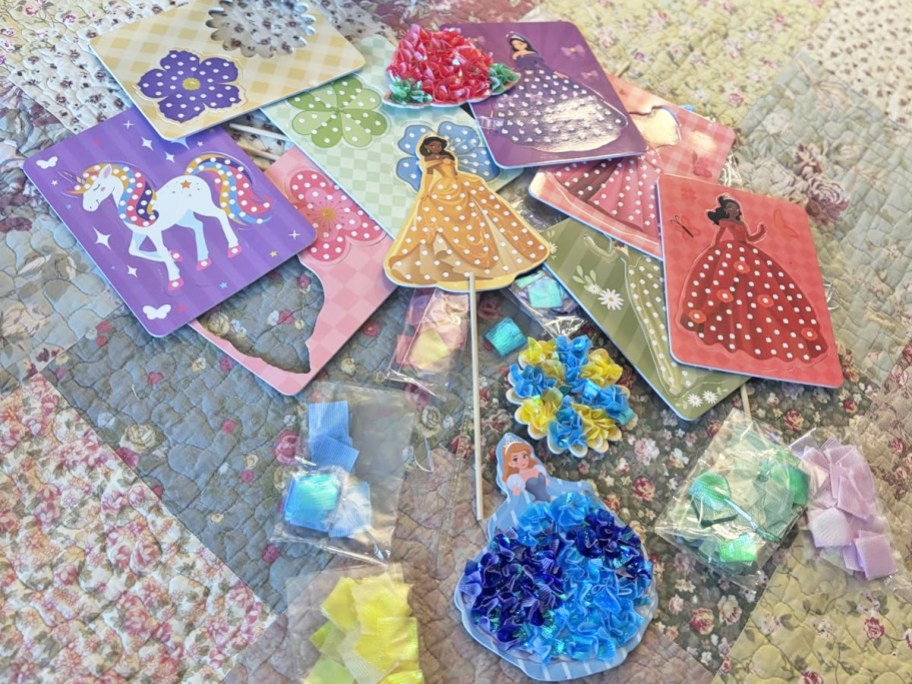 princess and unicorn poke art kit supplies on a floor