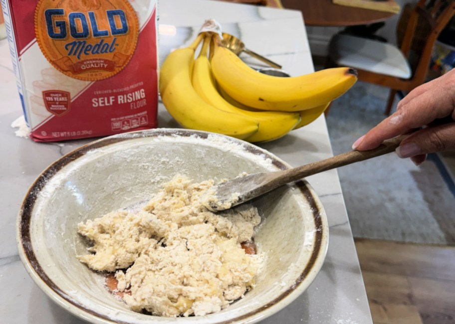 adding flour to mashed banana donuts (1)
