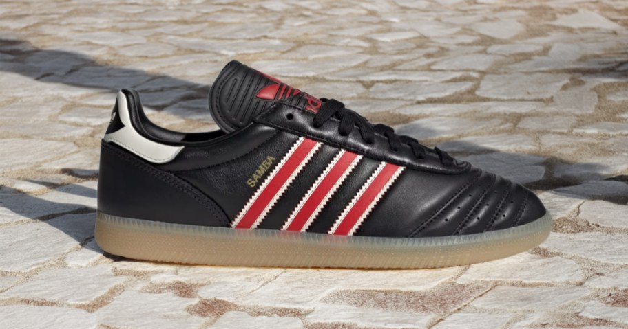 adidas Sambas for kids on a stone floor
