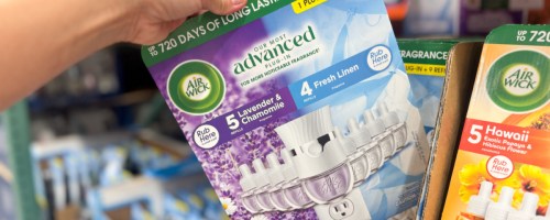 hand grabbing plug in warmer pack off shelf