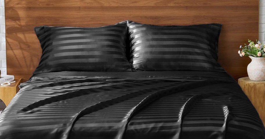 black satin sheets on a bed