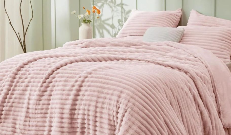 bedsure bedding set in pink displayed on the bed