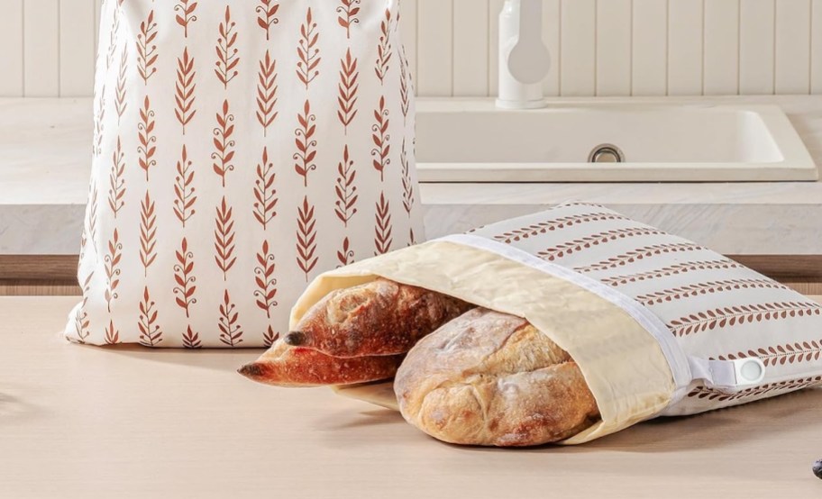 breas loaves coming out of beeswax bread bags on countertop