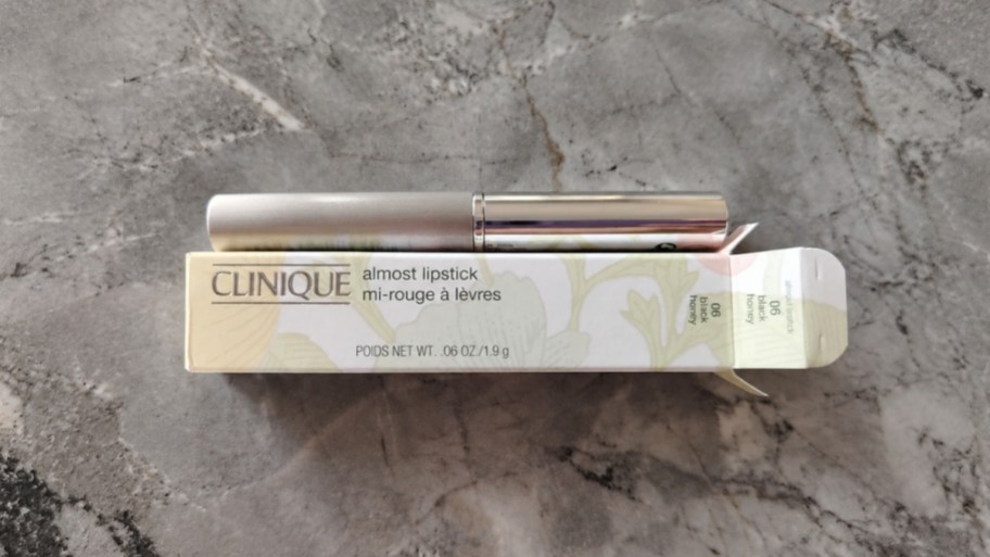 a tube of clinique almost lipstick with packaging