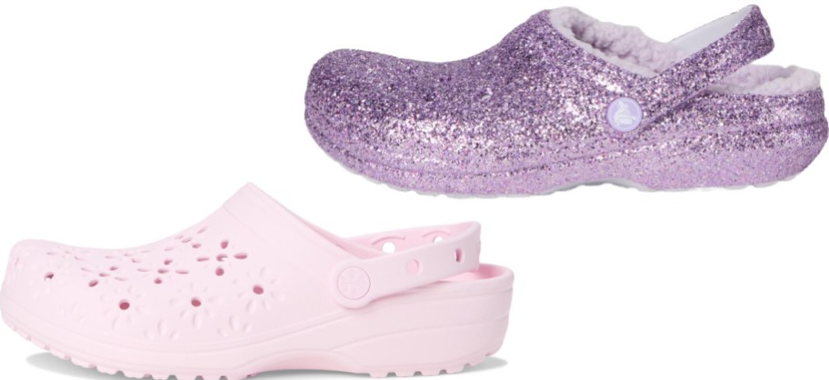 A pair of Crocs shoes featuring a light pink pair with floral cutouts and a purple glitter-covered lined clog.
