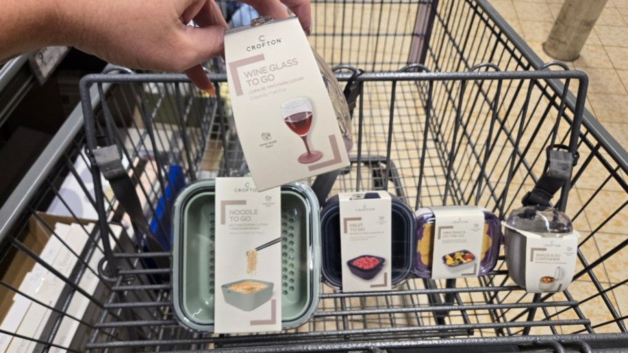 hand holding mini wine glass shown with various mini cookware