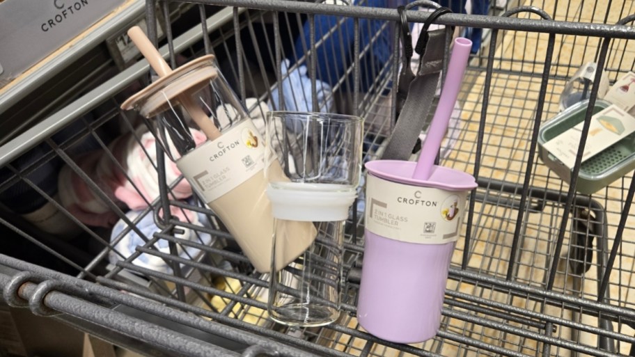 three glass tumblers in a cart