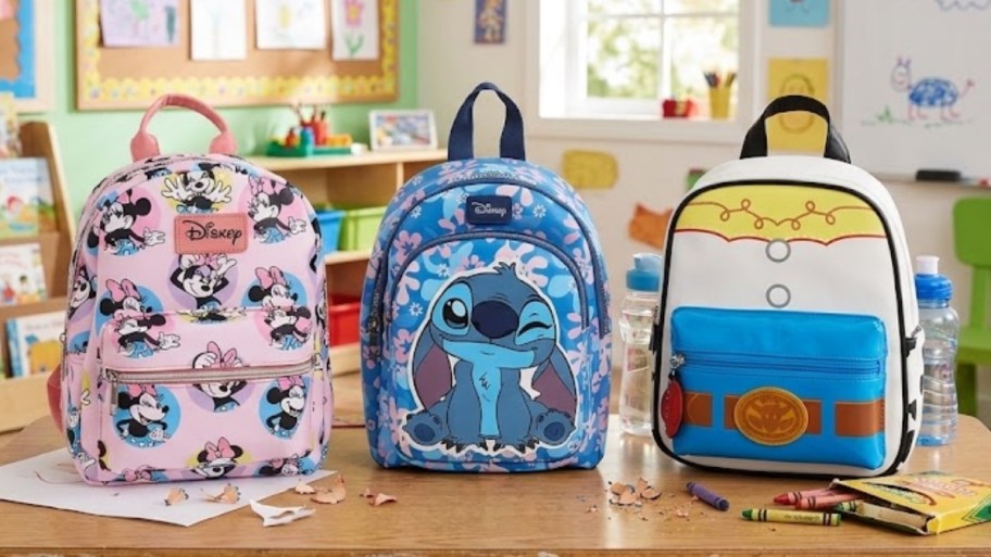 three disney backpacks in a kids classroom